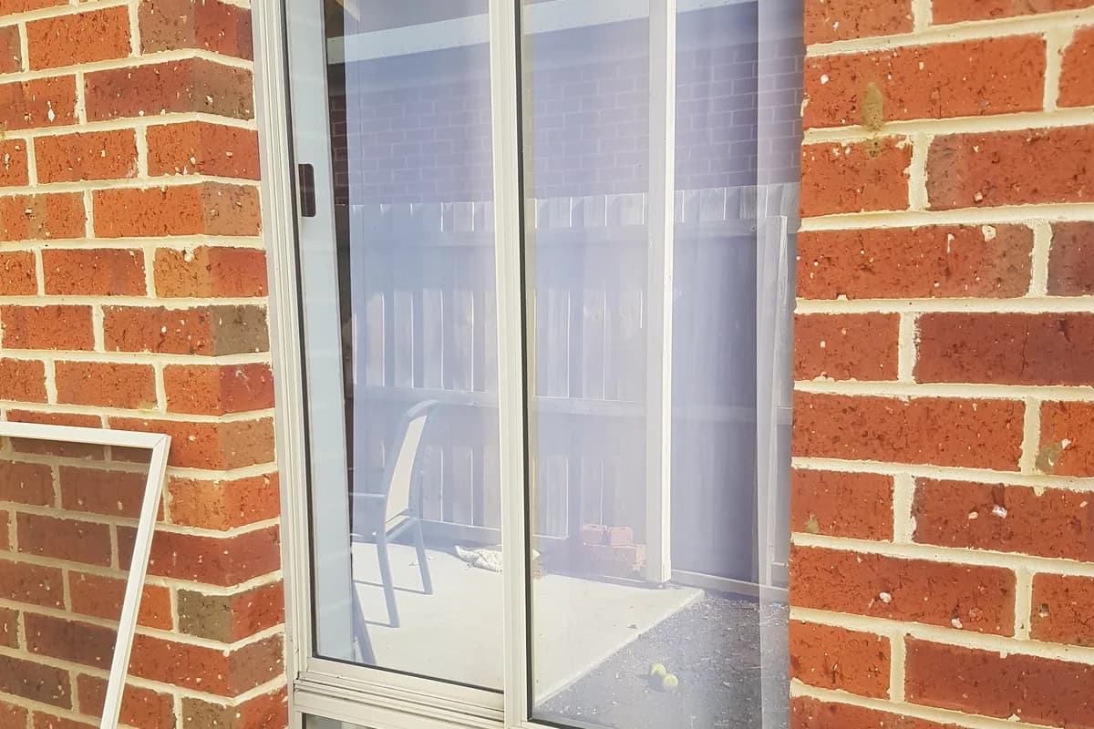 Recent job in Highton: a clean glass sliding door in a red-brick wall